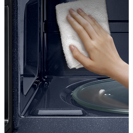 Samsung 2.1 cu. ft. Over-the-Range Microwave with Edge to Edge Glass Display in Matte Black Steel